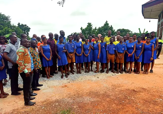 PW MINING WORKERS TOGETHER WITH THE SCHOOL ADMINISTRATION AND STUDENTS